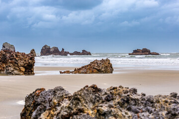 Rocks on the Beach of Cape Hillsborough during Stormy Weather, Queensland, Australia.