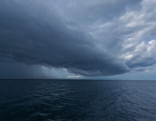 Dark with  Dramatic blue sky and dark as  Dramatic blue sea color and dark storm raining cloud background