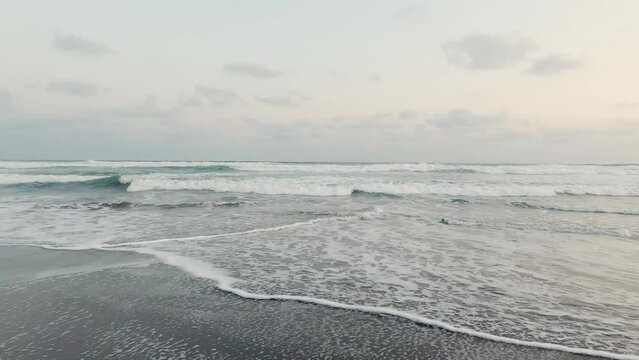 4K footage of waves at Parangtritis beach, Yogykarta, indonesia in the afternoon 