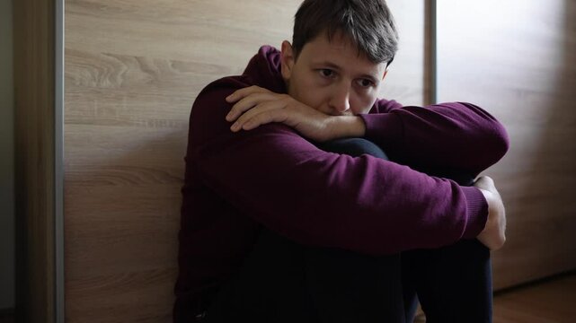 Emotional expression: man's reaction of fear and worry