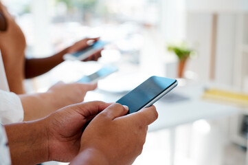 Business people, hands and phone for collaboration with networking connection, app sync and data share in office. Staff, mobile group chat and teamwork for solidarity, support and message broadcast