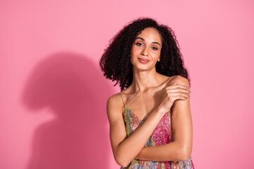 Obraz premium Photo portrait of lovely young lady embrace self dressed stylish sequins garment isolated on pink color background