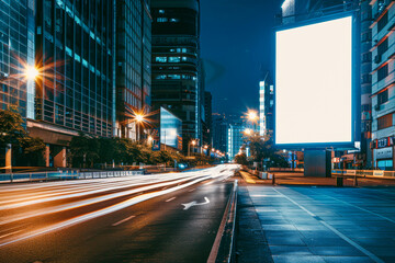 Blank white billboard on city street