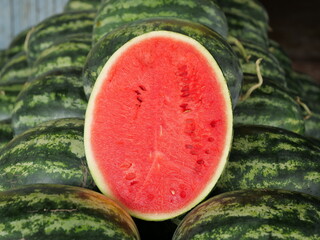 Watermelon cut in half see red inside green shell