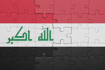 puzzle with the colourful national flag of yemen and flag of iraq.