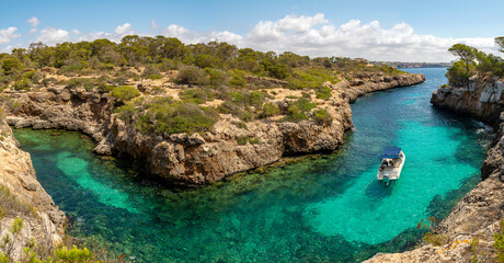 Obraz premium Cala Beltrán is a beautiful serpentine shape hidden cove in the municipality of Llucmajor, Mallorca, Balearic Islands, Spain