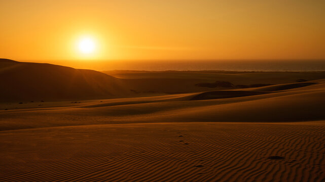Sunset in the dunes near Walvis Bay in Namibia