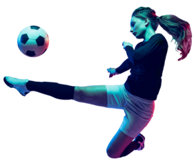 Dynamic image of determined and focused girl, soccer player in mid-air, motion, hitting ball in jump and scoring goal isolated on transparent background. Sport, competition, tournament, game concept