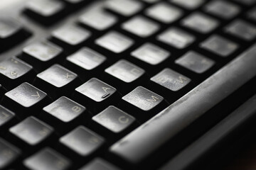 Close-Up of Black Computer Keyboard with Dusty Keys for Technology Background