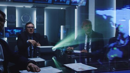 Executives Engage in a Meeting, Analyzing Global Data Projected Onto a Screen. Diverse Team Collaborates on Strategic Government World Trading and Import Logistics Transportation Service - Powered by Adobe