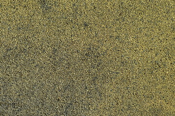 close-up of rug or decorative tiles with a granular texture 