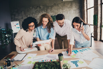 Photo of talking phone call discuss teamwork young people work together successful business conference meeting nice creative light office