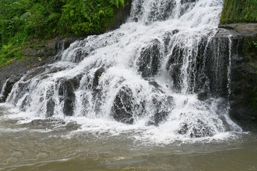 Uma Anyar Waterfall, at Kemenuh village, Gianyar Regency of Bali Indonesia, with beautiful nature landscape