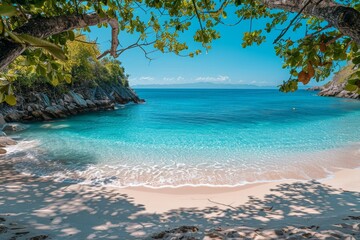 A panoramic view of a beach with clear blue water and white sand