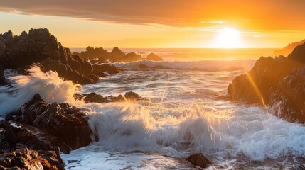Fototapeta premium Beautiful sunset over the ocean, waves crashing against the beach and rocks