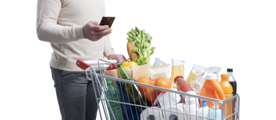 Man doing grocery shopping and connecting with his smartphone