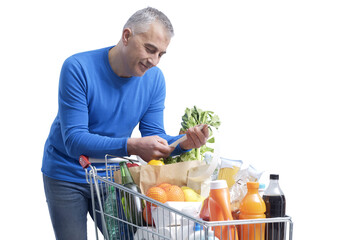 Man checking the grocery receipt