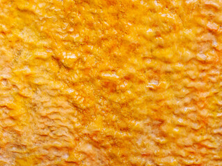 Close-up background of Groundwater stains or raw water that has algae Yellow-red sediment, rust,...