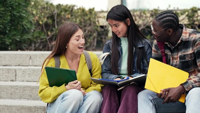Asian girl together with student friends preparing for University exams - Learning Teamwork
