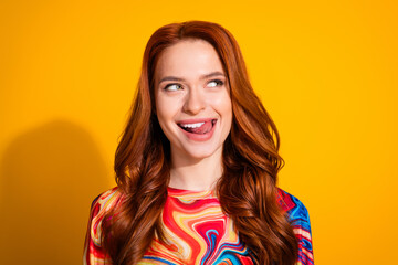 Photo portrait of attractive young woman lick teeth look empty space dressed stylish colorful...