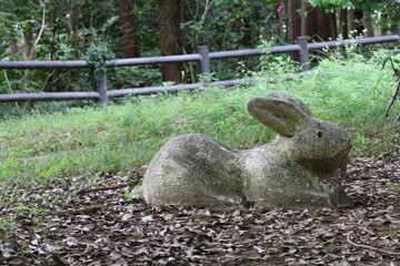 Rabbit figurine in the park