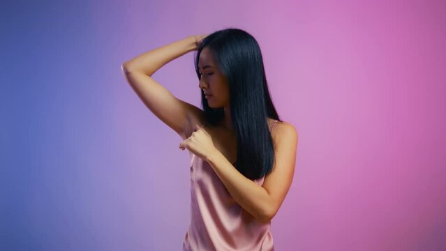 Young woman displeased with her underarm skin condition, hair removal gone wrong