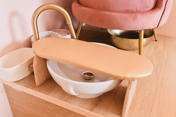 Chair and tub for pedicure in a beauty salon