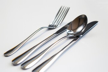 Close up shot of a silverware set on a table