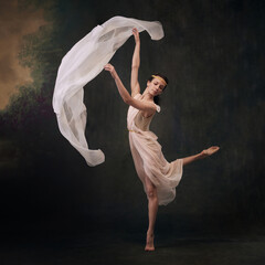 Graceful Elegance. Beautiful dancer in flowing white gown, captured mid-leap against vintage studio...