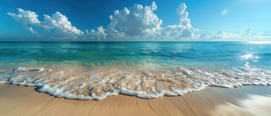 Blue Ocean Waves Crashing on Sandy Beach.