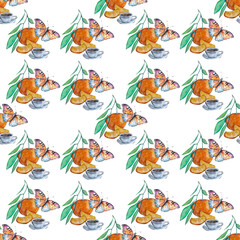 cup of tea and orange with butterfly