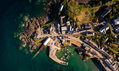 Aerial view directly above the Cornish fishing village of Coverack and its historic harbour