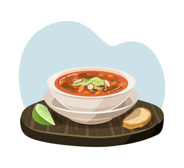 Pozole soup with lime and bread.