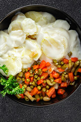 potatoes with vegetables second course natural fresh appetizer meal food snack on the table copy space food background rustic top view keto or paleo diet