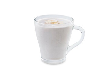 Banana milkshake with banana slices in a glass on a white isolated background