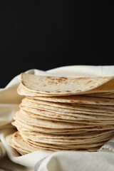 Stack of tasty homemade tortillas on table