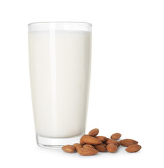 Glass of almond milk and almonds isolated on white