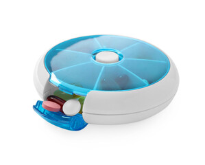 Different pills in organizer isolated on white