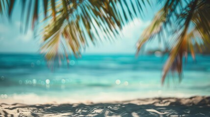 Fototapeta premium idyllic blurred tropical beach with turquoise water and palm trees summer