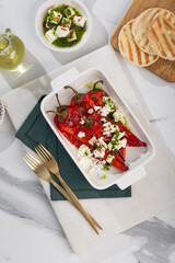 Grilled Peppers with Feta Cheese and Pita Bread on a Rustic Table for a delicious appetizer
