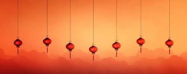 Chinese Lanterns Hanging Against Orange Sky.