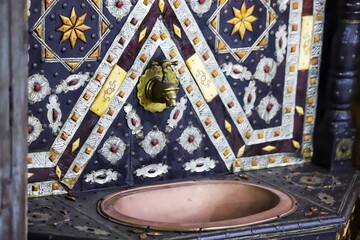 Traditional Moroccan washbasin, mosaic, decorated tap.