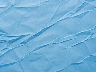 Obraz premium A detailed shot of a sheet of blue paper with no distractions, perfect for use as a placeholder or in designs where a subtle background is needed