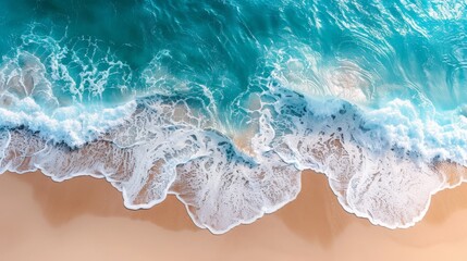 Fototapeta premium abstract sand beach from above with light blue transparent water wave and sun lights, summer vacation background concept 