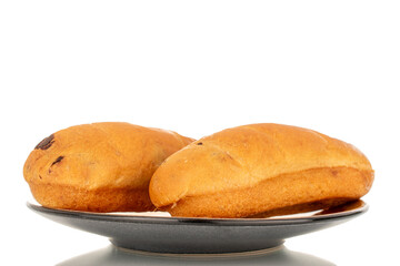 Two sweet buns with ceramic saucer, macro, isolated on white background.