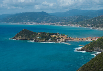 Panoramic aerial view of Bay of Silence and colorful, picturesque historical town Sestri Levante, Italy, popular resort in Liguria italian Mediterranean sea coast penisula. From Punta Manara path