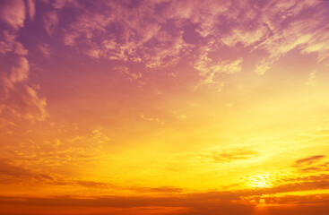 Blazing cloudy sky at sunset. Gradient color. Sky texture. Abstract nature background