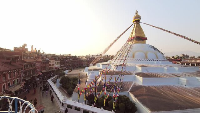 Kathmandu, Nepal - 15th november, 2023: time lapse of visitors sightseeing Bouddha or Boudhanath on sunset. First stupa in Kathmandu, Nepal. Popular travel destination landmark