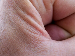 extreme close-up hand detail of a man