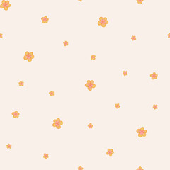 Seamless pattern wiyh yellow flowers on a light orange background